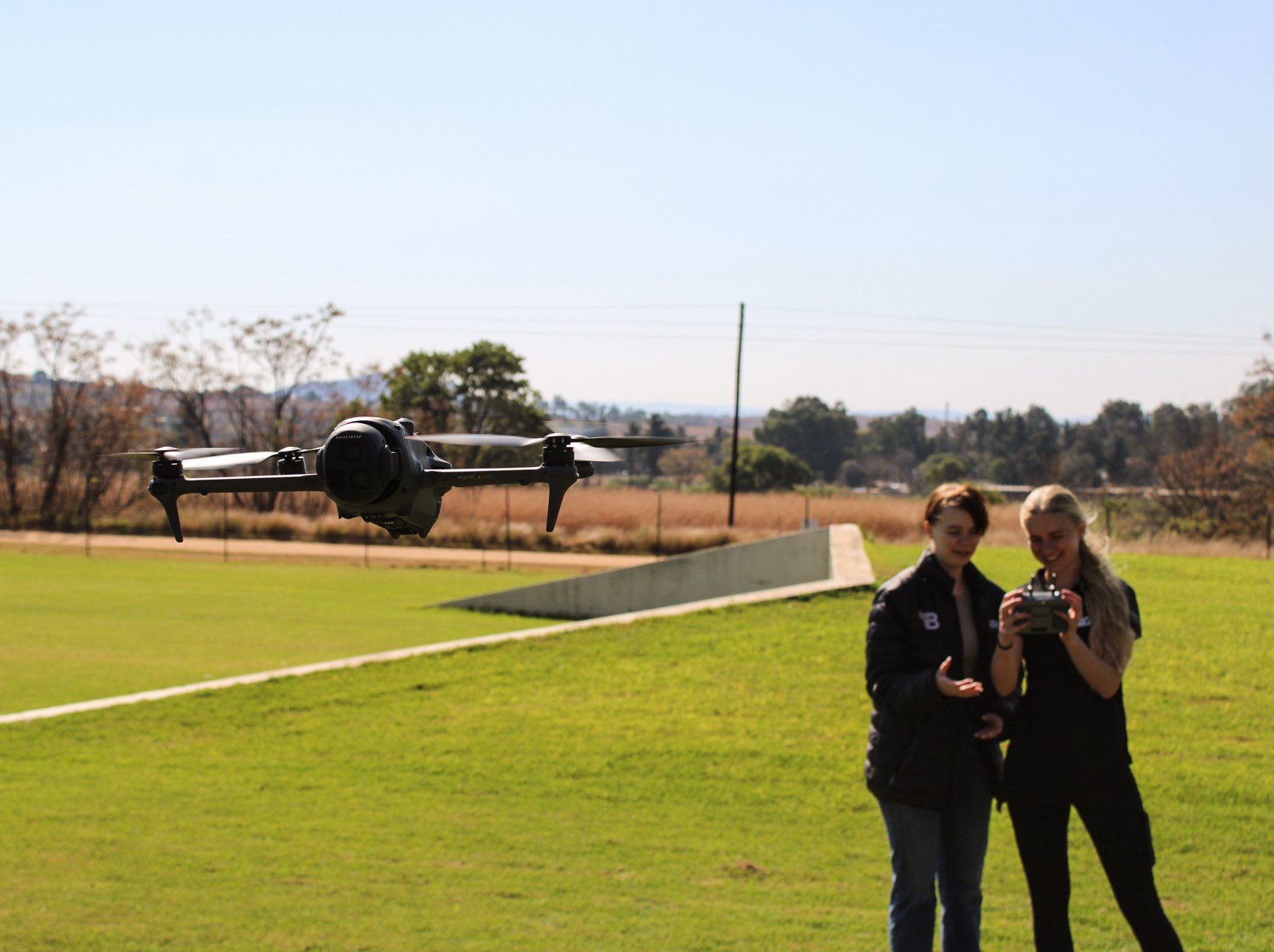 TEN8 ground team monitoring drone on a long-range surveillance flight